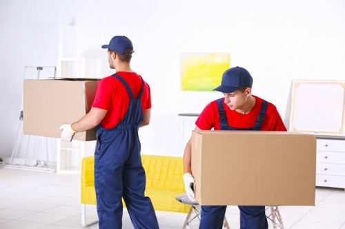 Man and van moving service in Greenwich with a local residential street background