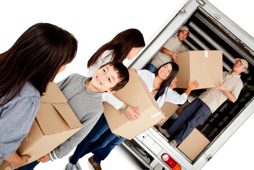 Local moving van loading furniture for a Greenwich property move