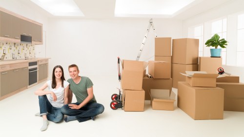 Removal van prepared for a household move in Greenwich with boxes and furniture