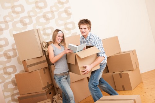 Family home relocation setup with boxes and furniture in Greenwich