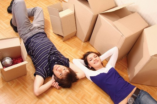 Removal truck and movers managing apartment access in Greenwich