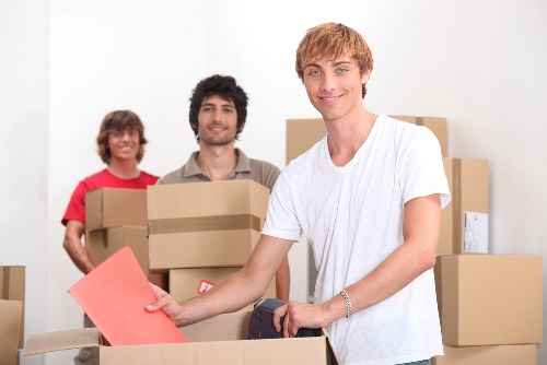Commercial removals team transporting office items in Greenwich